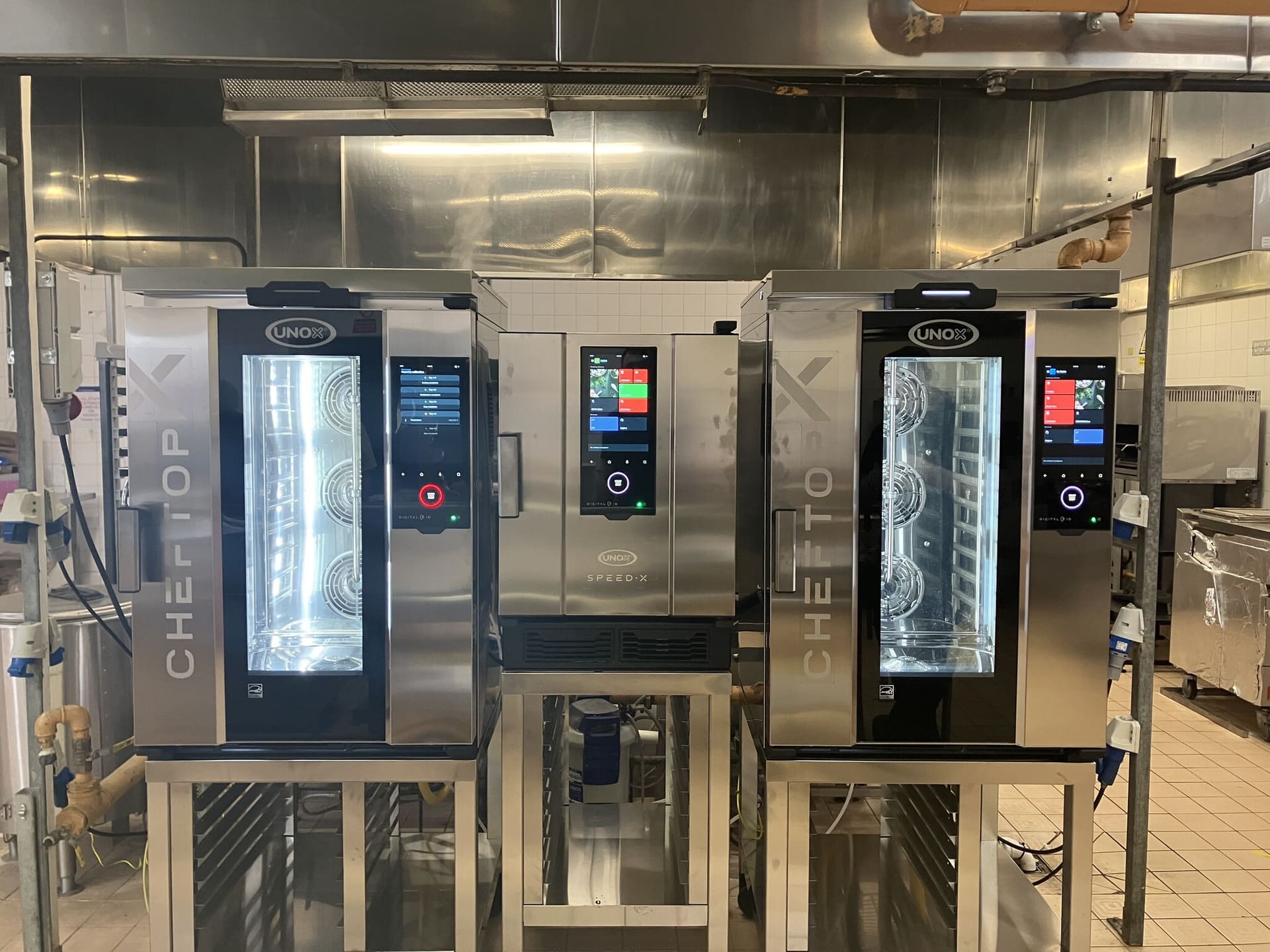 Engineer testing electrical systems in a commercial kitchen